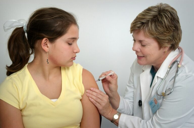 Doctor administering GLP-1 weight loss injection to patient under clinical supervision in India weight loss treatment